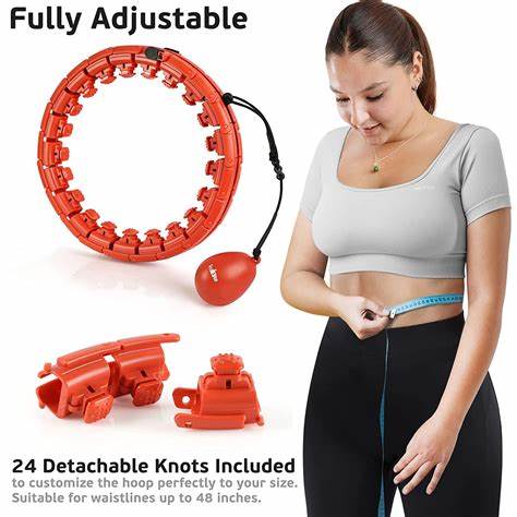 Red smart weighted fitness hoop with detachable knots and woman measuring waistline.